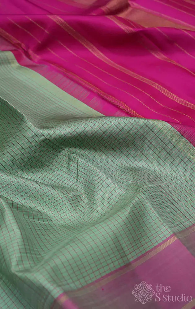 Mint green kanchi silk saree with pink border