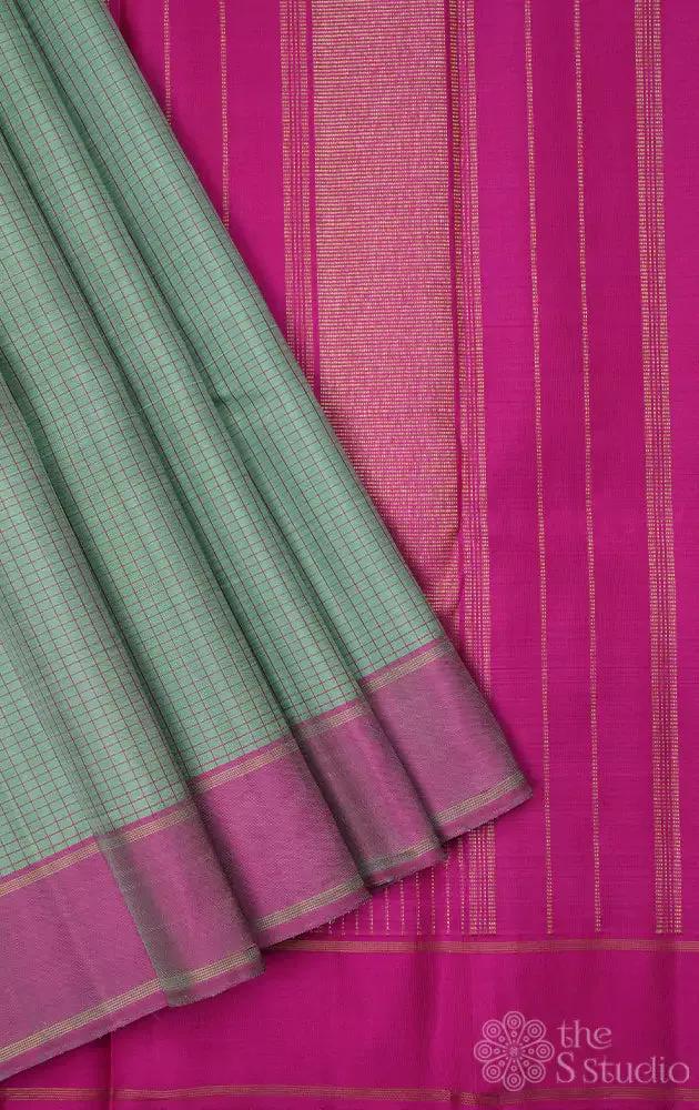 Mint green kanchi silk saree with pink border